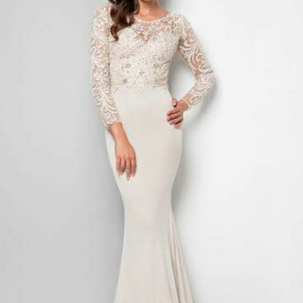 Terani Couture 
Cream Colored long sleeve Mermaid Gown